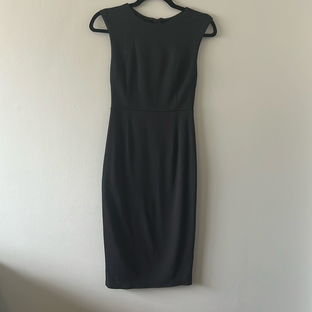 Express Midi Dress in Black. Full zipper detail down back. Size 00